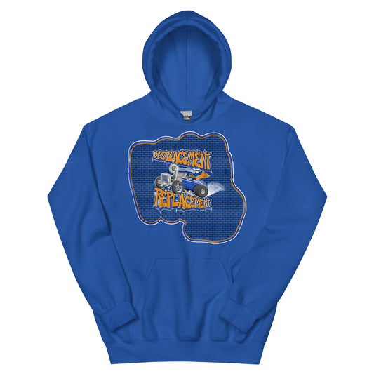Blue hoodie with orange and blue illustration of a retro coupe with a small engine and a giant turbo charger spinning it's wheels in front of a brick wall with a crash test dummy driving and graffiti styled text that reads Displacement Replacement.
